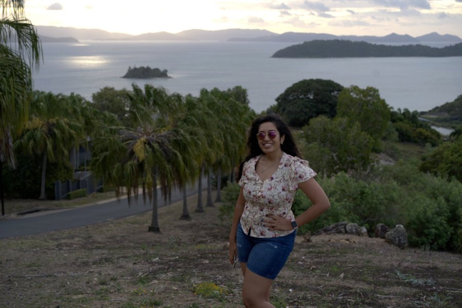 Meenu on One Tree Hill, with palms below and islands out to sea