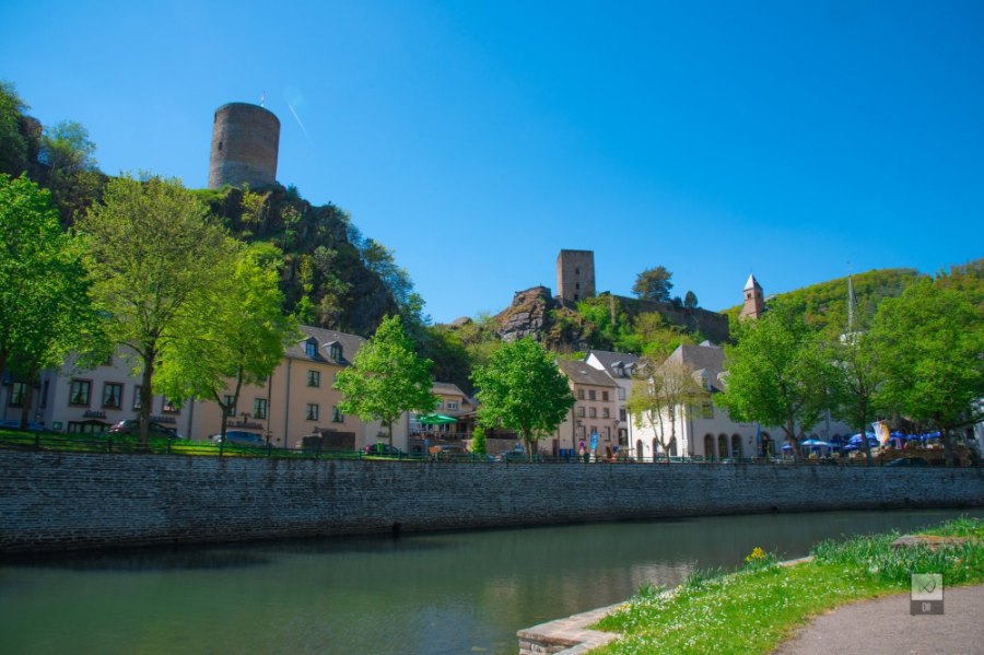 Esch-sur-Sûre's ruined round tower and keep on the rocks above the village and the river