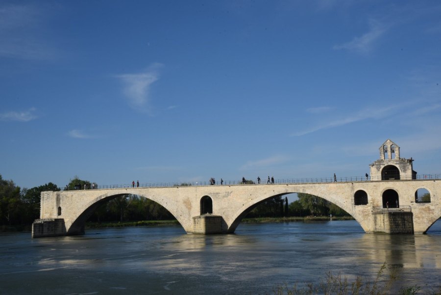 Avignon's broken bridge stopping partway across the Rhône, with a small chapel on one of its piers
