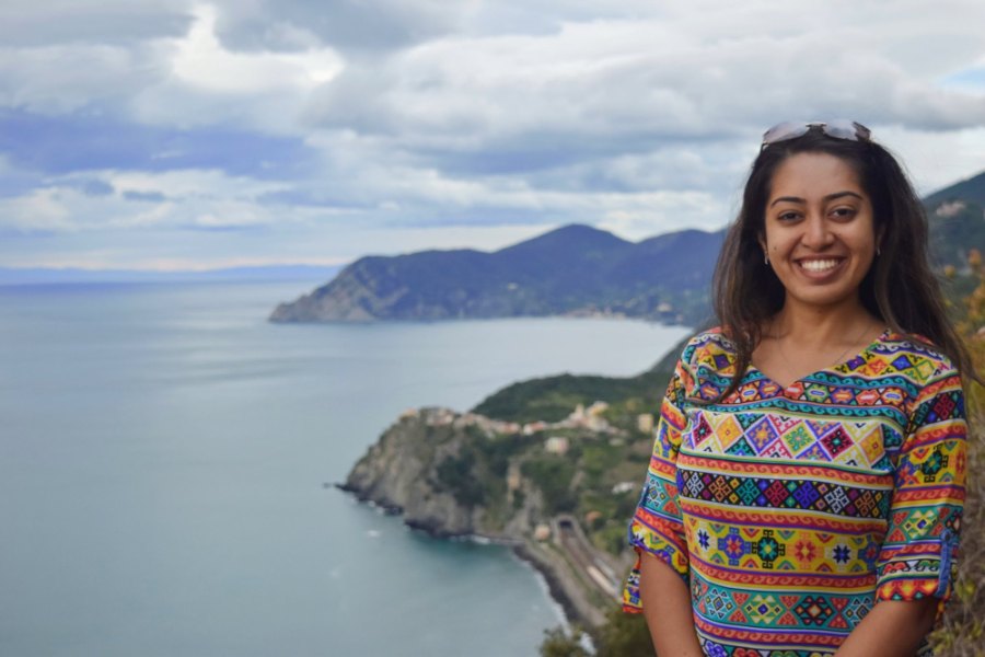 Meenu high above the sea, with Corniglia on its headland and the coast running away behind her