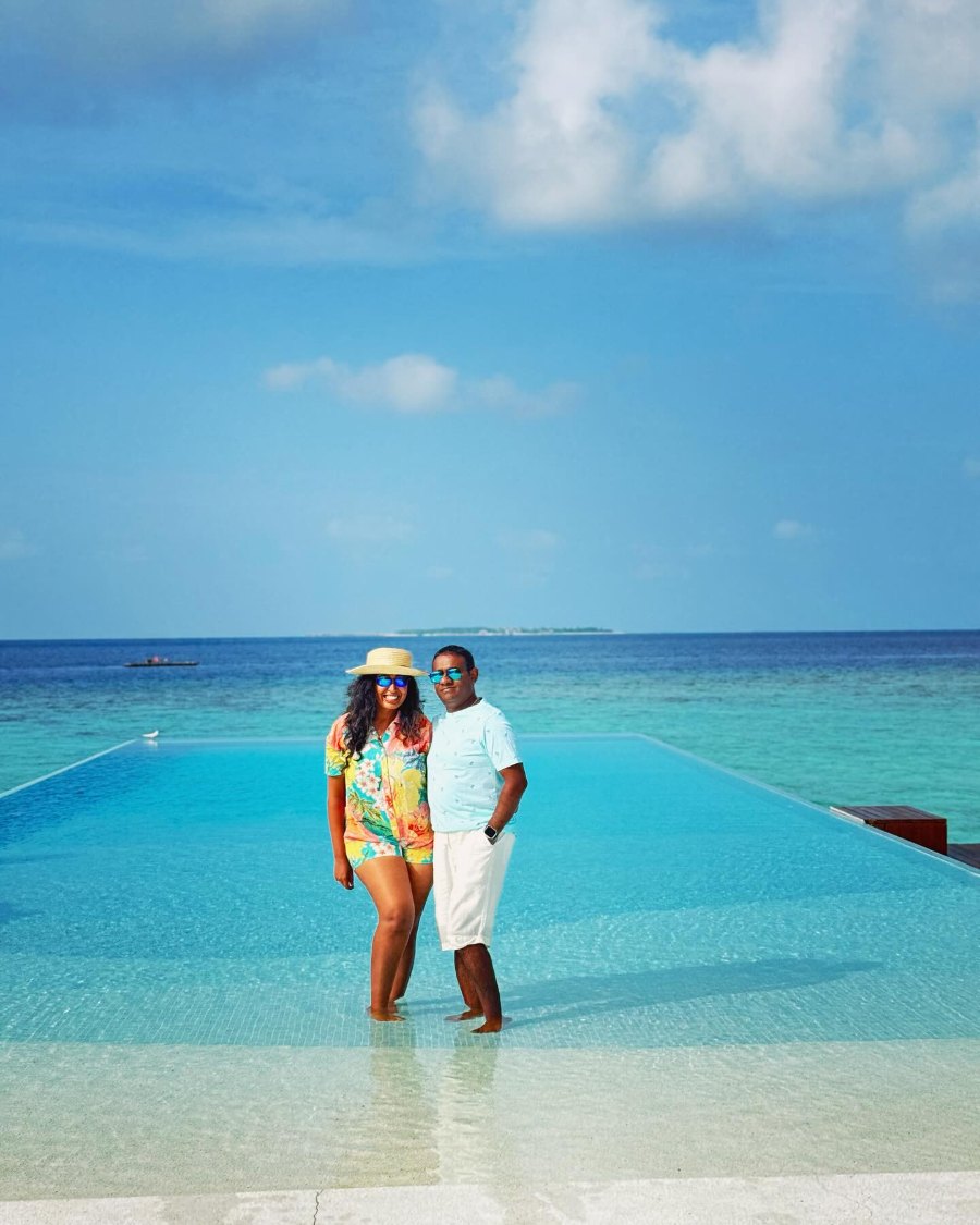 Meenu and Praddy at the infinity pool bar above the lagoon