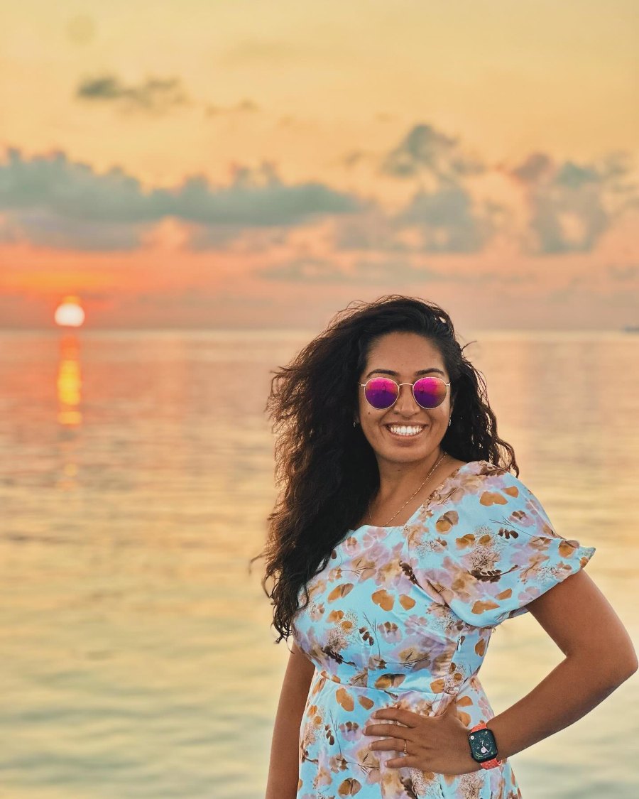 Meenu on a dhoni at sunset over the Indian Ocean