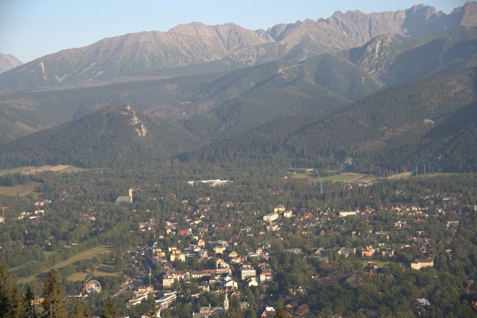 Zakopane spread across the valley below Gubałówka, with the Tatra peaks along the skyline