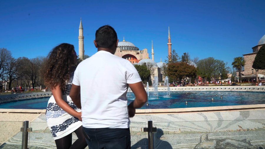 Meenu and Praddy by the fountain in front of Hagia Sophia